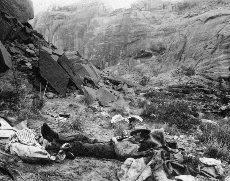 John Wetherill napping at Rainbow Bridge in 1909. Courtesy of Harvey Leake