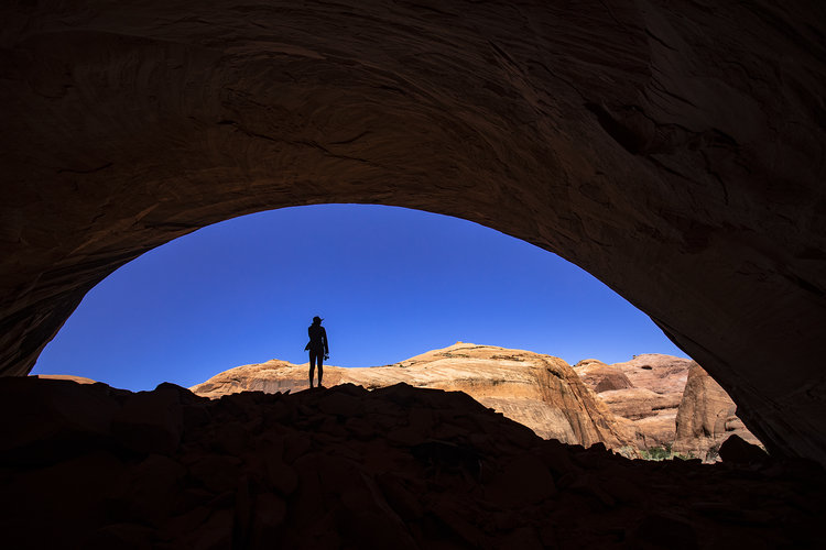 A huge alcove shelters a large Basketmaker II site. Photo by Stephen Eginoire